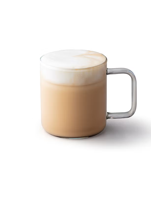 Un cappuccino într-o cană de sticlă