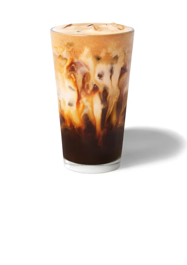  Un espresso cu zahăr brun și ovăz rece, într-un pahar înalt 